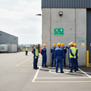 Gray Premium Fire Assembly Point Up Arrow Sign for Safety Guidance