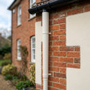 Aluminium Flush Joint Downpipe Sample — RAL 9010 / 76mmØ (in use)