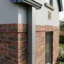 Aluminium Flush Joint Downpipe Sample — RAL 7037 / 72x72mm (in use)