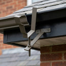 Moulded Ogee Gutter Rise and Fall Bracket 125 x 100mm — RAL 7022 (in use)