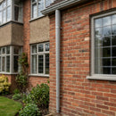 Aluminium Flush Joint Downpipe Sample — RAL 7036 / 76mmØ (in use)