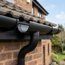 Half Round Aluminium Gutter Outlet 63mm Dia. 125mm — RAL 9005 (in use)