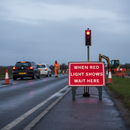 Dark Gray Professional Wait Here Sign - 1050x750mm Safety Indicator