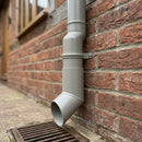 63mm Diameter Flush Joint Aluminium Downpipe Shoe — RAL 7036 (in use)