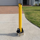 Fold-down steel driveway bollard, yellow, 4-bolt ground fixing
