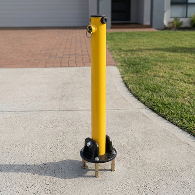 Fold-down steel driveway bollard, yellow, 4-bolt ground fixing