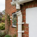 Traditional Adjustable Swanneck 76mm Dia Downpipe Connector — RAL 9010 (in use)