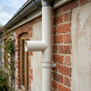 76mm Diameter Flush Joint Downpipe Branches — RAL 9016 / 92.5 Degrees (in use)