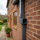 Flush Joint Aluminium Downpipe Bend 72x72mm — RAL 7037 / 92.5 Degrees (in use)