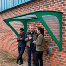 Wall-mounted smoking shelter, space-saving design, 3-person capacity