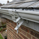 Moulded Ogee Gutter Rise and Fall Bracket 125 x 100mm — RAL 7035 (in use)