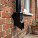 Traditional Aluminium Downpipe Shoe 72x72mm — RAL 9005 (in use)