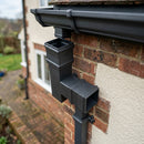 72x72mm Traditional Square Aluminium Downpipe Branches — RAL 7021 / 92.5 Degrees (in use)