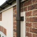 Aluminium Downpipe Clip 63mm Dia with 25mm Wall Offset — RAL 7022 (in use)