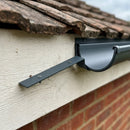 130mm Aluminium Gutter Top Rafter Bracket — RAL 7016 (in use)