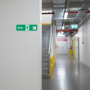 Gray Premium Fire Safety Exit Sign - Down Right Arrow Direction