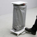 Free standing steel sack holder with foot pedal operation