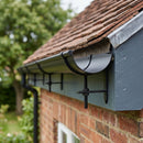 Half Round Aluminium Gutter Rise and Fall Bracket 125mm — RAL 9005 (in use)