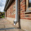 76mm Diameter Flush Joint Aluminium Downpipe Shoe — RAL 7035 (in use)