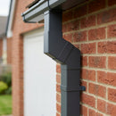 Flush Joint Aluminium Downpipe Bend 72x72mm — RAL 7016 / 112.5 Degrees (in use)