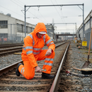 Slate Gray High-Performance Breathable Hi-Vis Orange Overalls for Rail Use