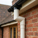 76mm Diameter Flush Joint Aluminium Downpipe Bends — RAL 9010 / 92.5 Deg (in use)
