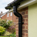 Traditional Adjustable Swanneck 76mm Dia Downpipe Connector — RAL 9005 (in use)