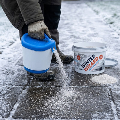 Hand-held salt spreader for pathways and driveways