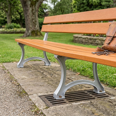 Outdoor cast steel and oak bench with stainless steel support