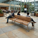 Curved tubular bench with hardwood slats