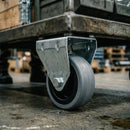 Black Pressed Steel Fixed Castors With Grey Rubber on Black Polypropylene Wheel - 50mm to 100mm